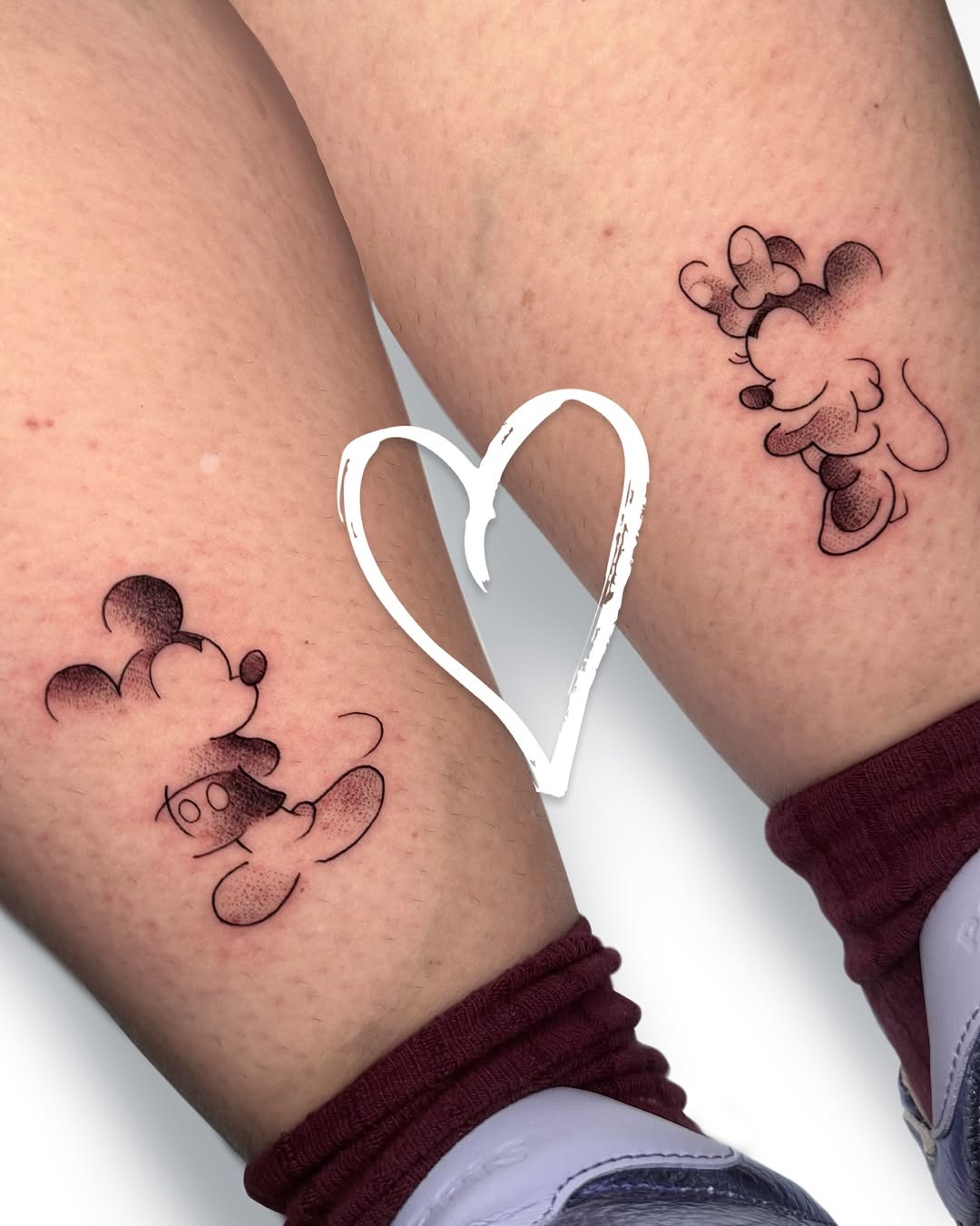 This image showcases two charming minimalist Mickey Mouse tattoos.