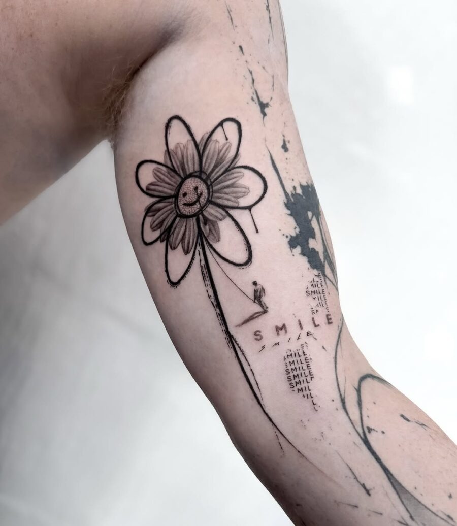 A cheerful flower tattoo with a smile symbol Tattoo Design
