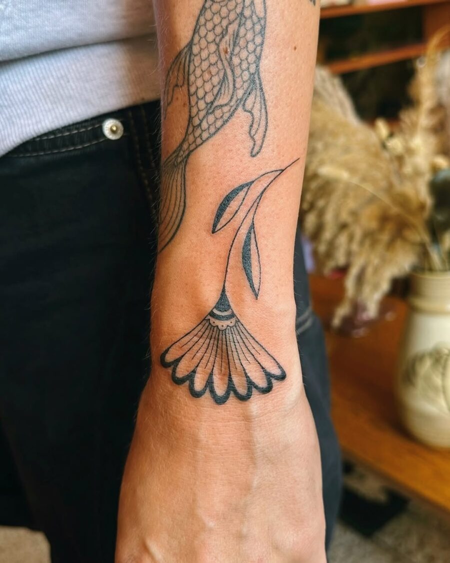 Delicate flower tattoo with mindful symbolism Tattoo Design