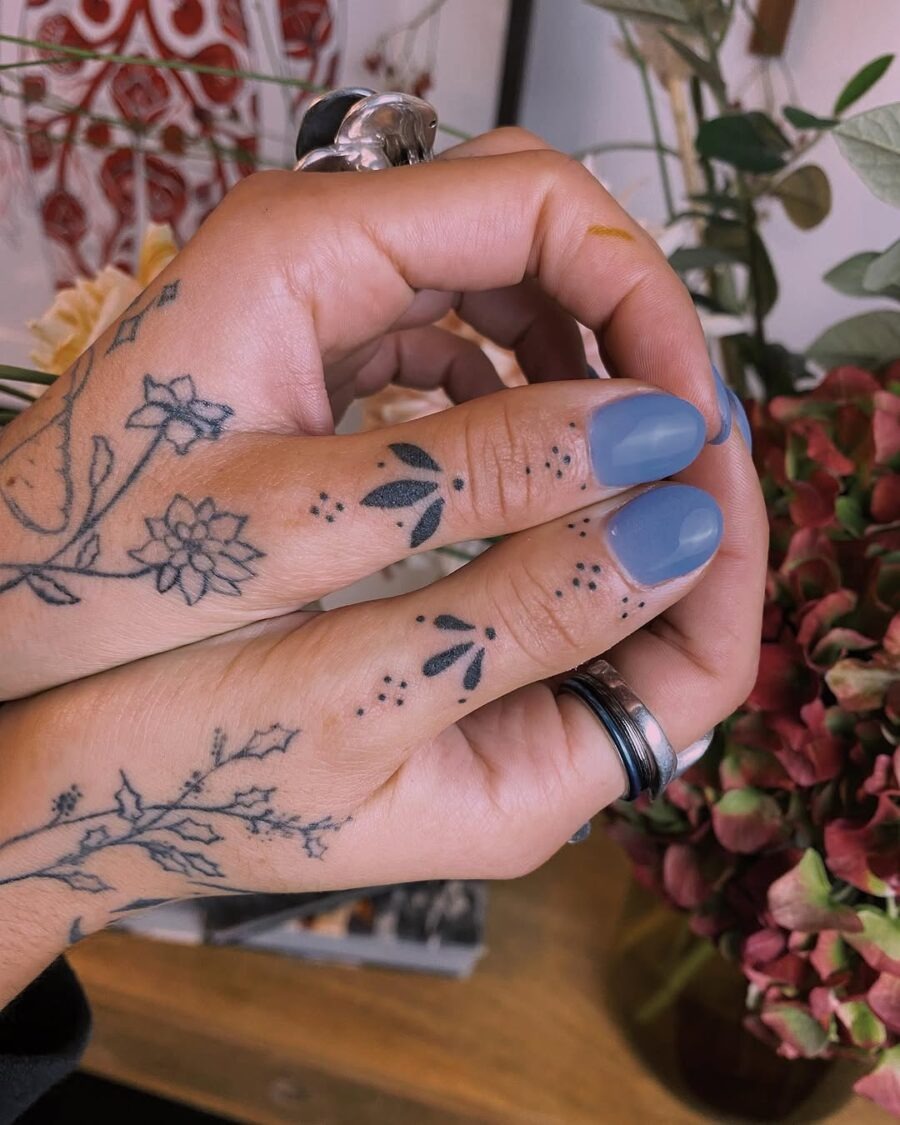 Delicate flowers symbolize tranquility and mindfulness. Tattoo Design