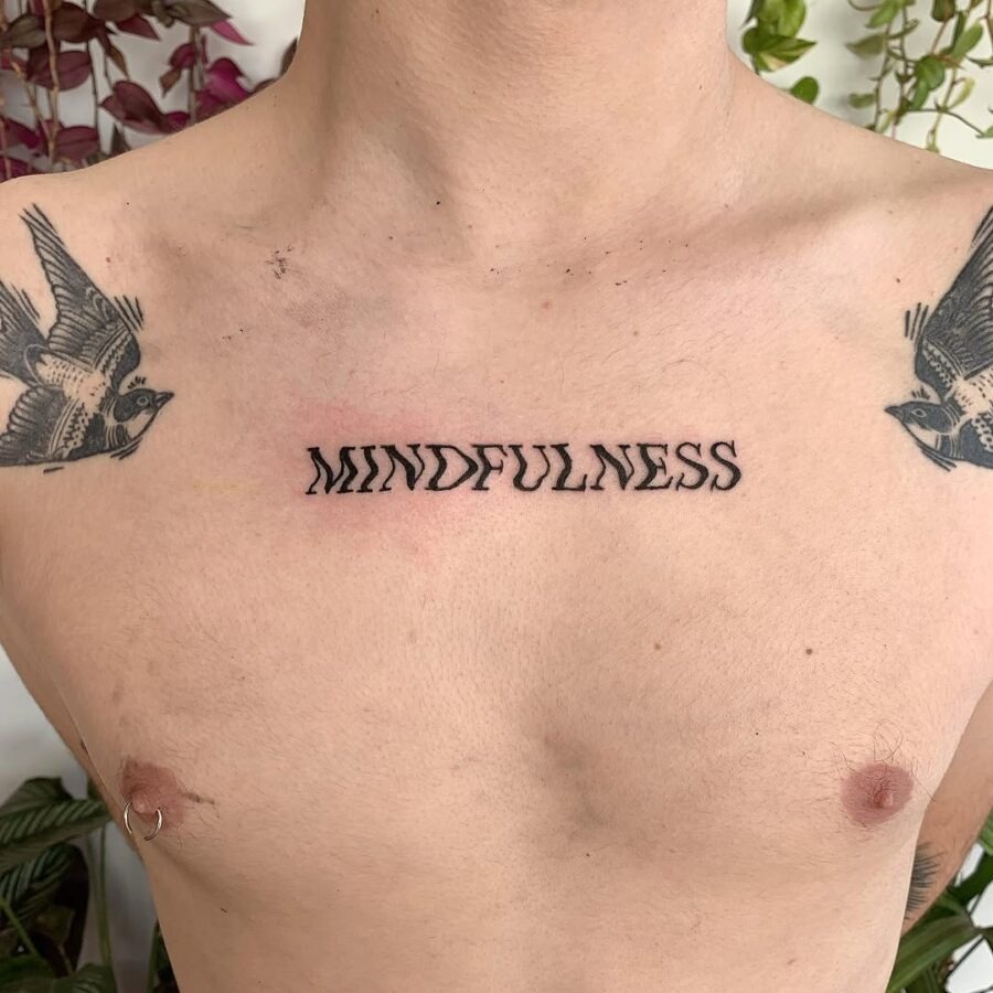 Elegant minimalist mindfulness tattoo on chest Tattoo Design