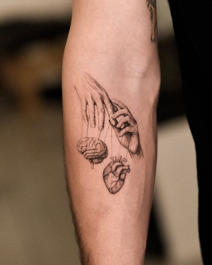 Symbolic hands connecting mind and heart Tattoo Design