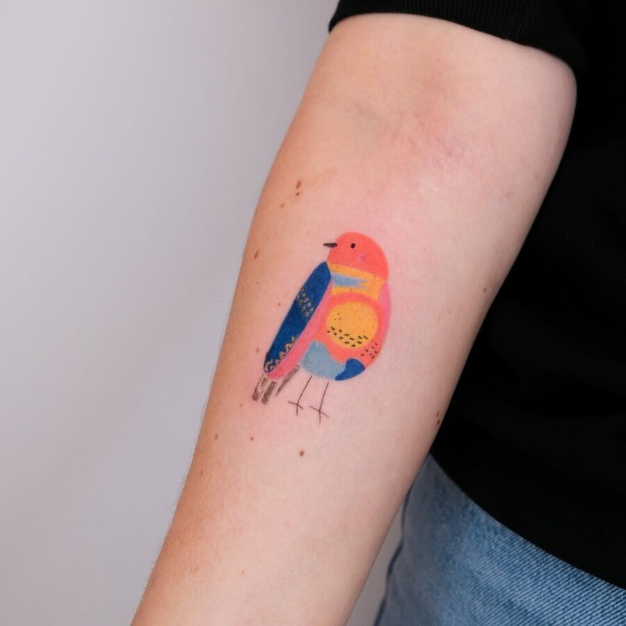 Vibrant bird tattoo promoting mindfulness and peace Tattoo Design