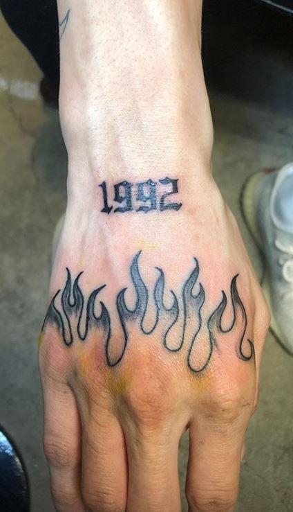 Flame Hand and Birth Year Tattoo Tattoo Design
