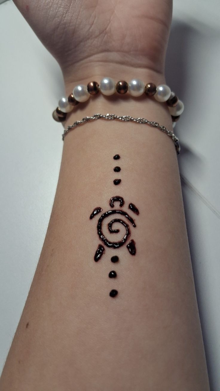 Swirly Star Wrist Tattoo Tattoo Design