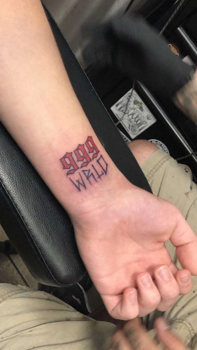Melting Earth With Lyrics Wrist Piece Tattoo Design