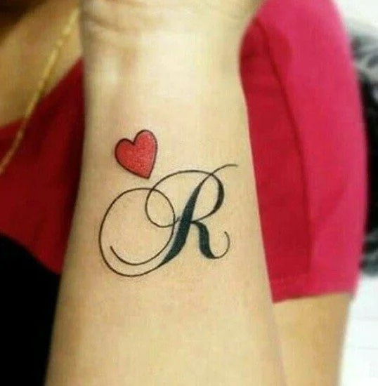 Moving towards a more comprehensive and artistic expression, a full sleeve tattoo incorporating the letter A within a larger, more complex design illustrates the versatility of designs initials.