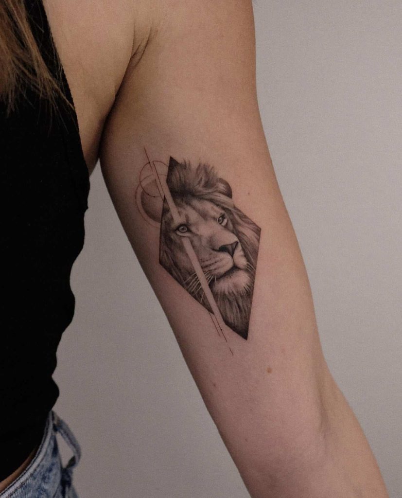Constellation-Inspired Lion Tattoo on Upper Arm Tattoo Design