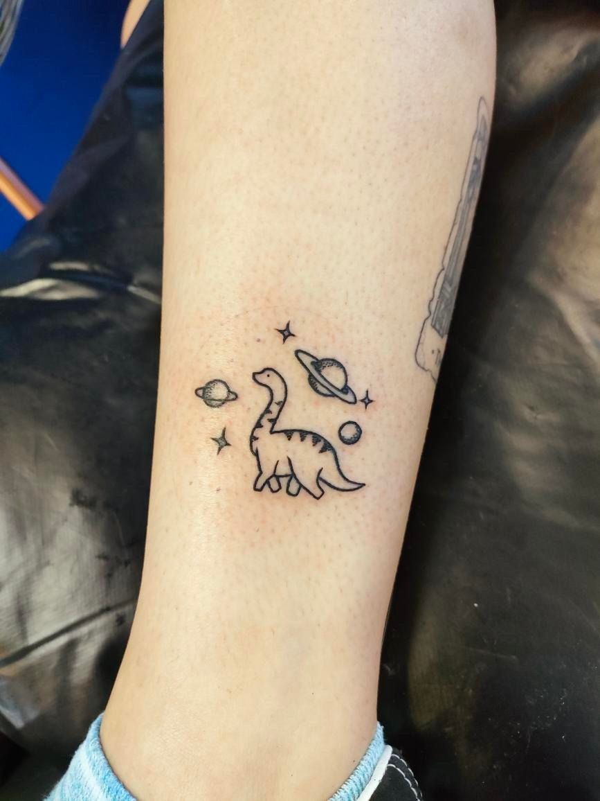 Dinosaur in Space Tattoo Tattoo Design