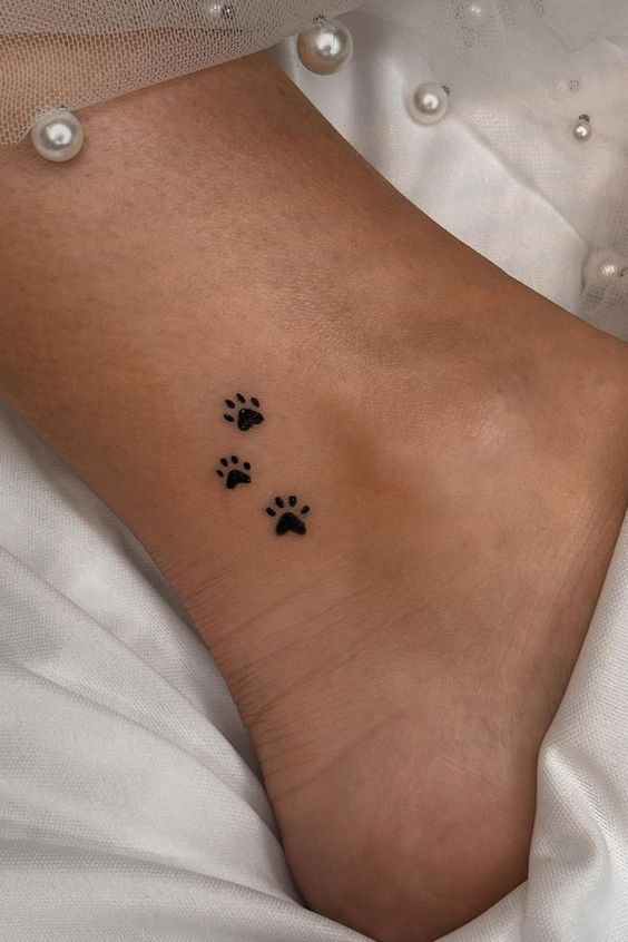 Tiny Paw Print Trail Tattoo Tattoo Design
