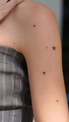 Tiny Scattered Star Tattoo Tattoo Design