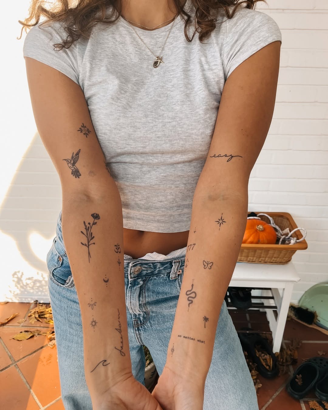 Charming assortment of minimalist tattoos on arms Tattoo Design