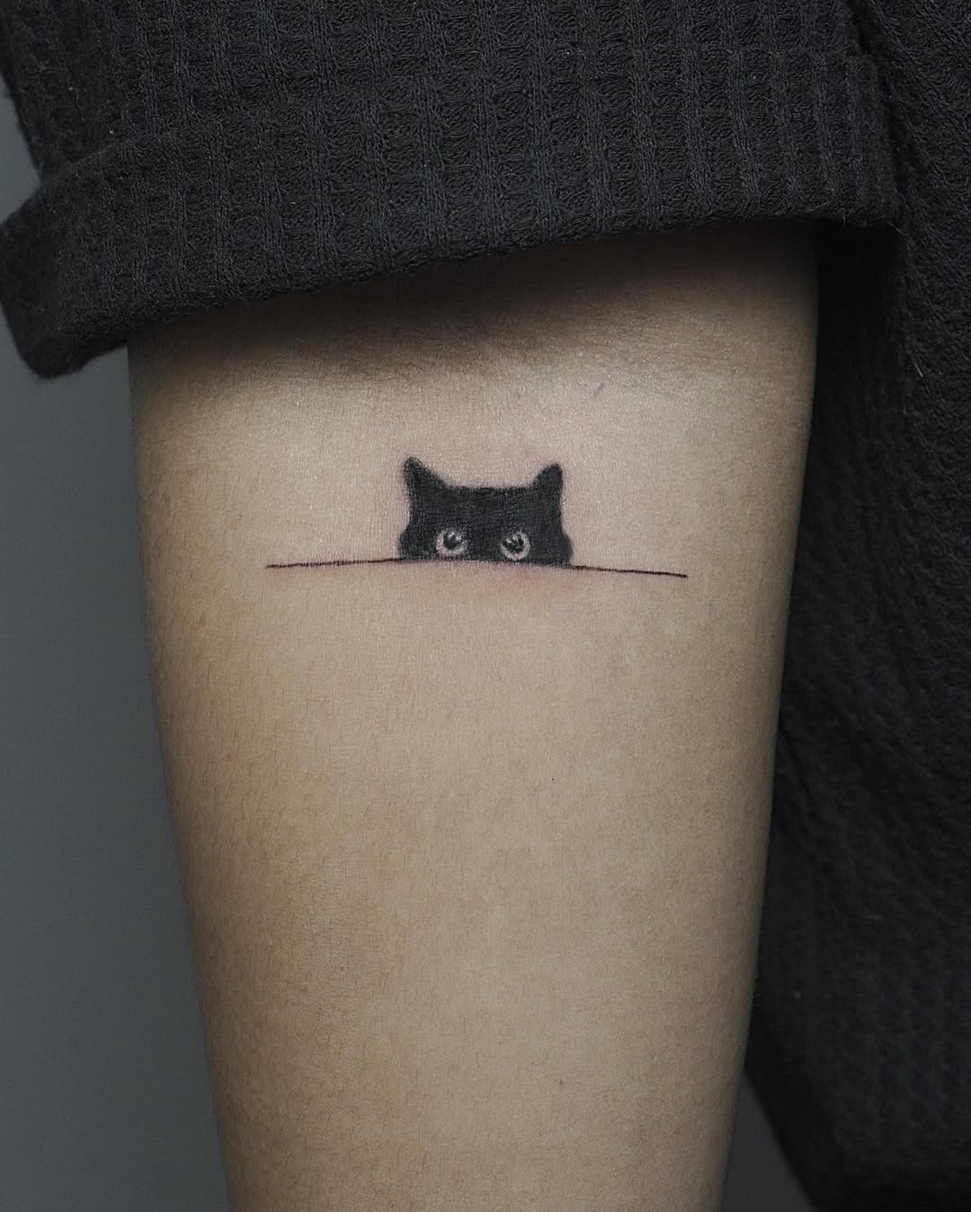 Charming cat peeking minimalist tattoo design Tattoo Design