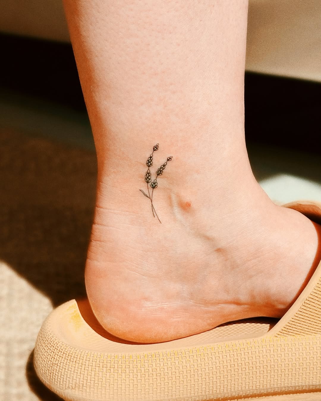 Delicate lavender tattoo on the ankle. Tattoo Design