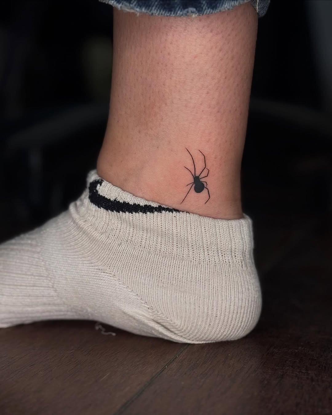 Delicate spider tattoo on the ankle Tattoo Design