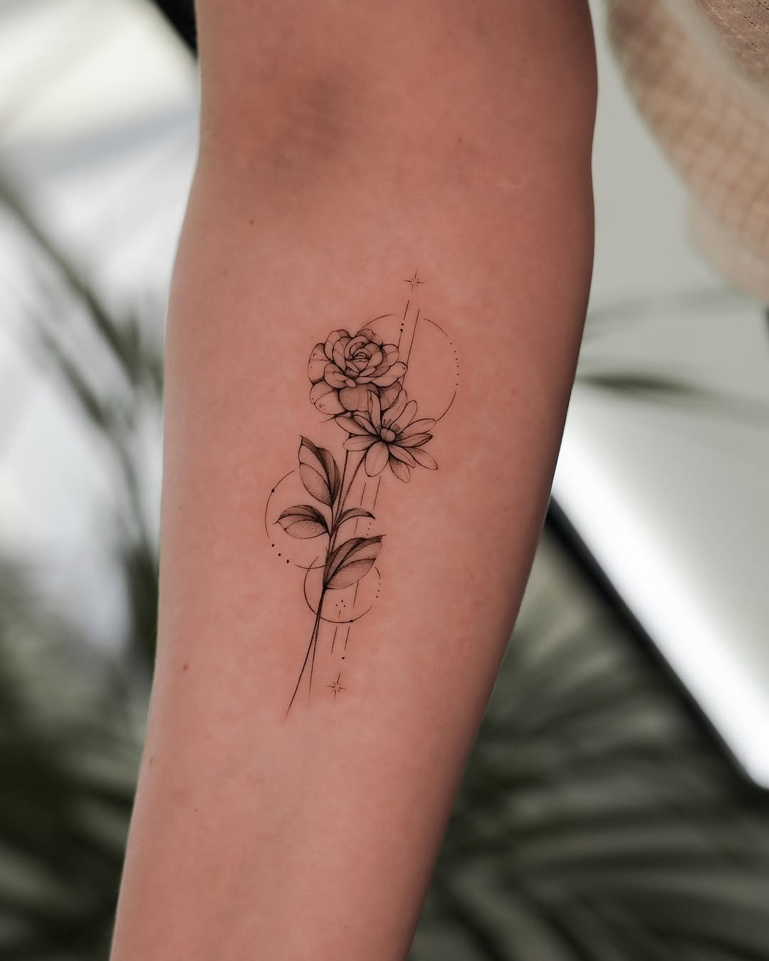 Elegant floral minimalist tattoo design on forearm Tattoo Design