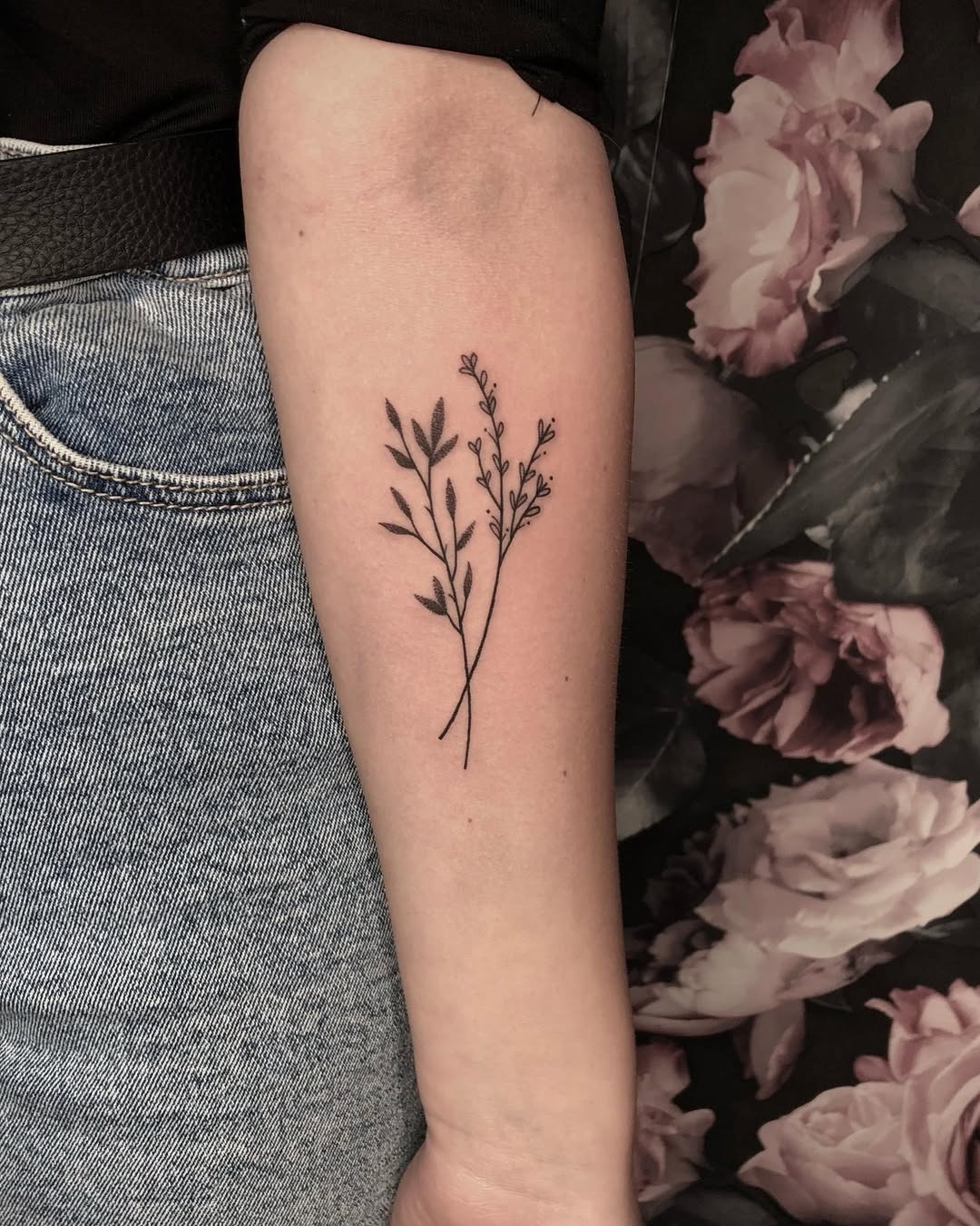 Elegant floral minimalist tattoo on forearm Tattoo Design