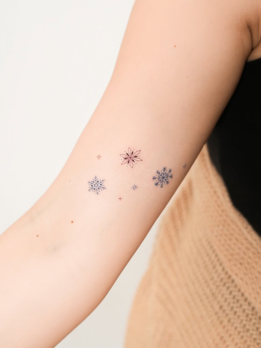 Elegant snowflake tattoos for a minimalist style Tattoo Design