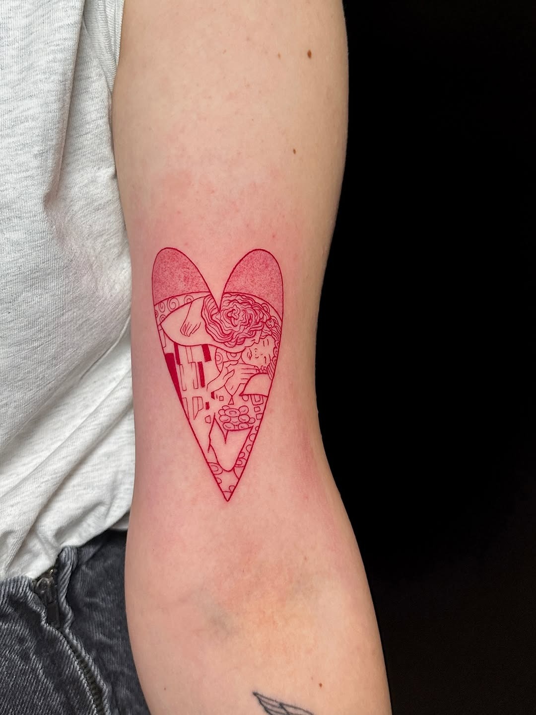 Intricate red heart-shaped minimalist tattoo design Tattoo Design