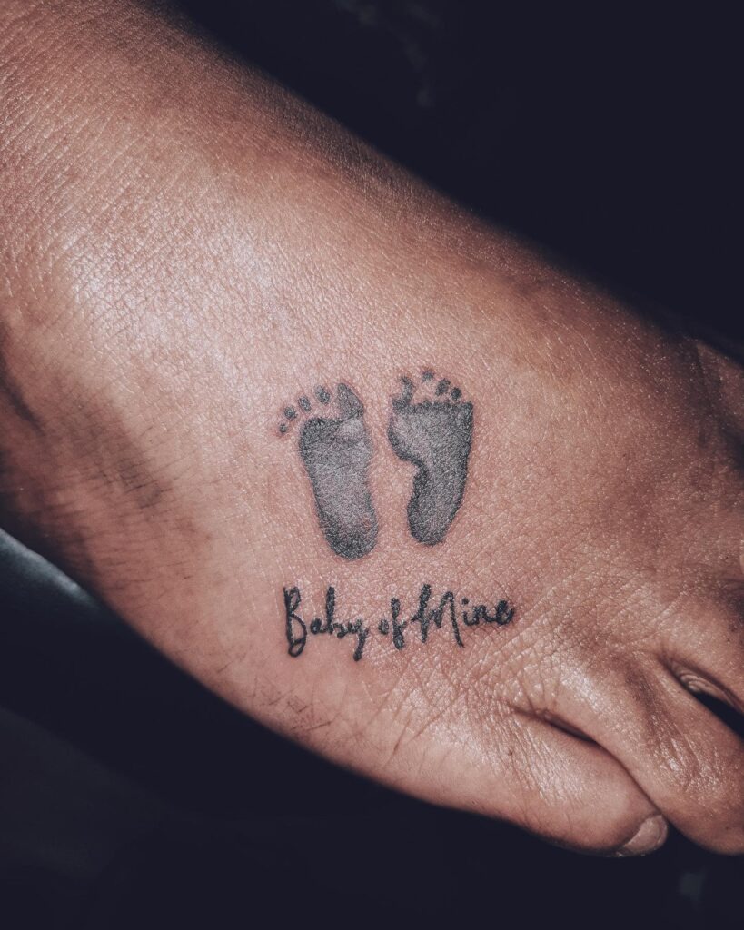 Baby Footprints with "Baby of Mine" Tattoo Tattoo Design