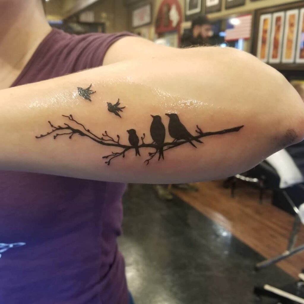 Family Bird Miscarriage Tattoo with Flying Chicks Tattoo Design