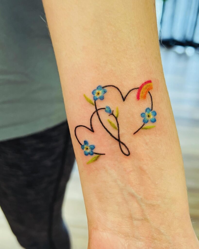 Intertwined Hearts with Forget-Me-Nots and Rainbow Tattoo Tattoo Design