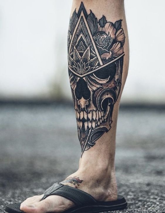 Skull with Floral and Geometric Elements: A Unique Blend Tattoo Design