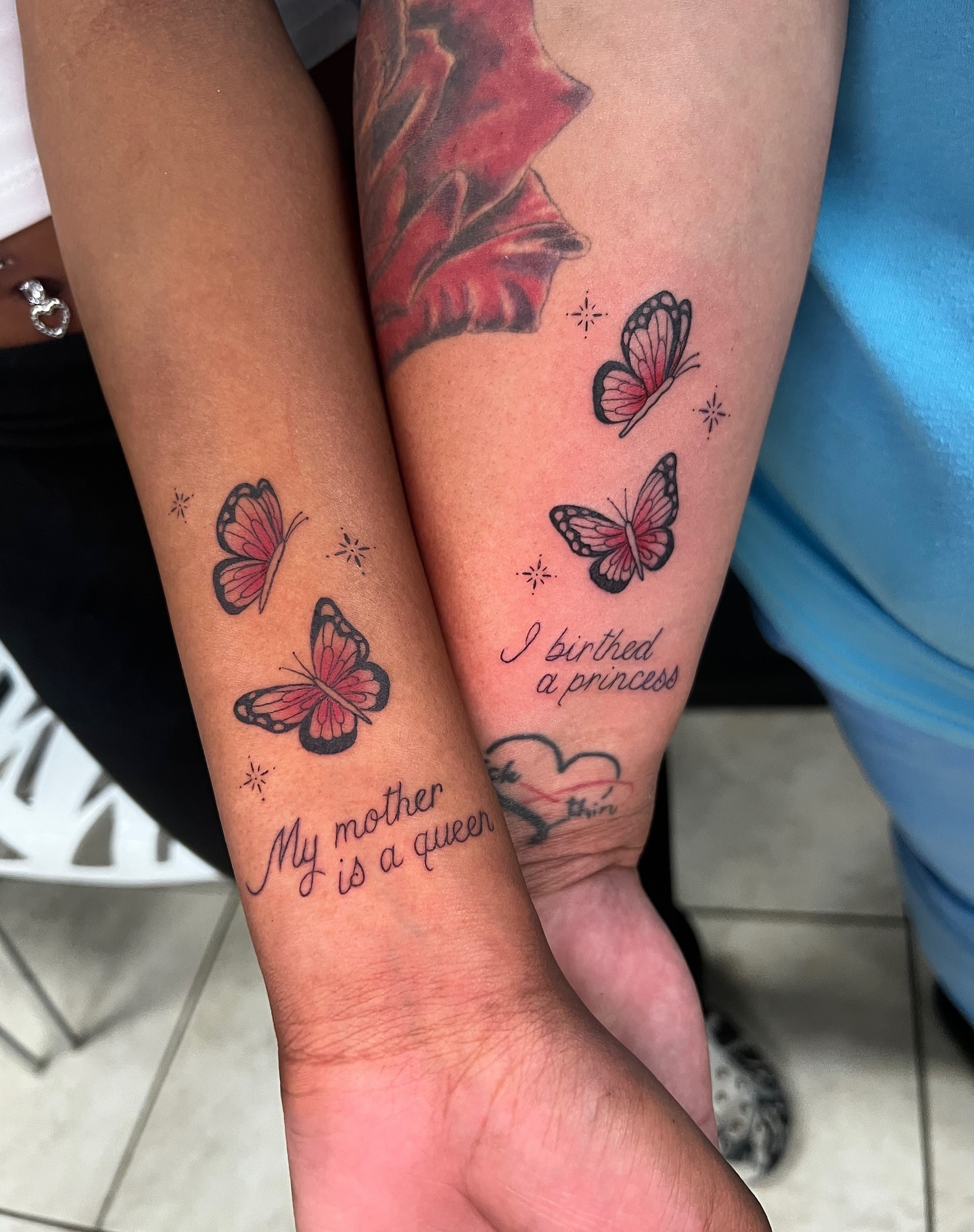 Matching Triskelion Tattoos on the Arms Tattoo Design