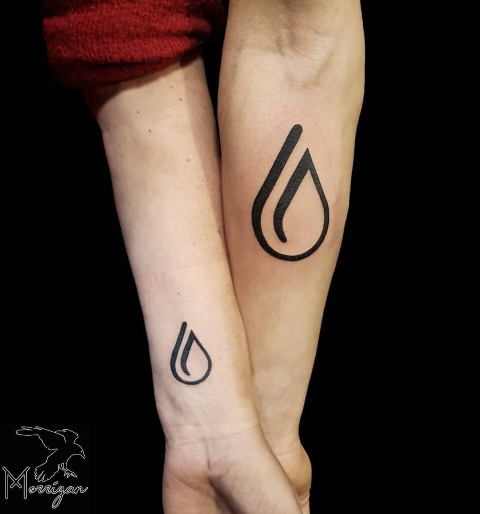 Mother and Baby Dinosaur Tattoo with Name and Date Tattoo Design