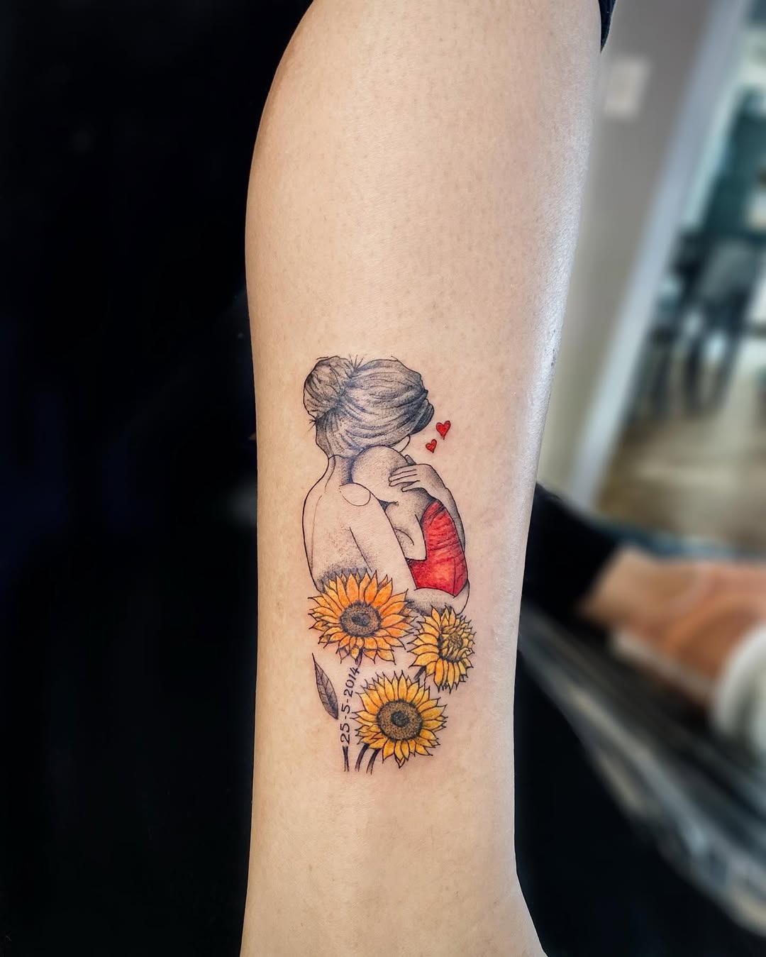 A heartfelt tattoo celebrating motherhood and love Tattoo Design