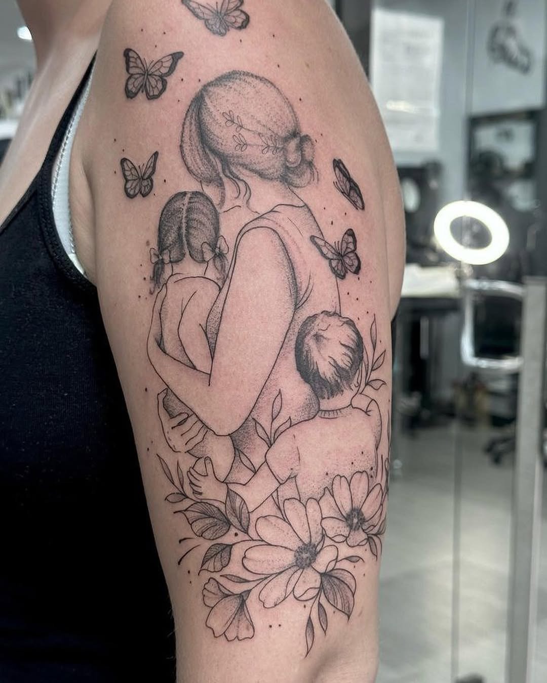 A heartfelt tribute to motherhood through ink Tattoo Design
