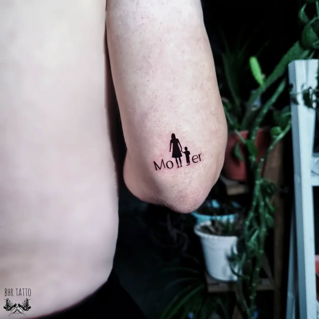Meaningful mother-child silhouette tattoo design Tattoo Design