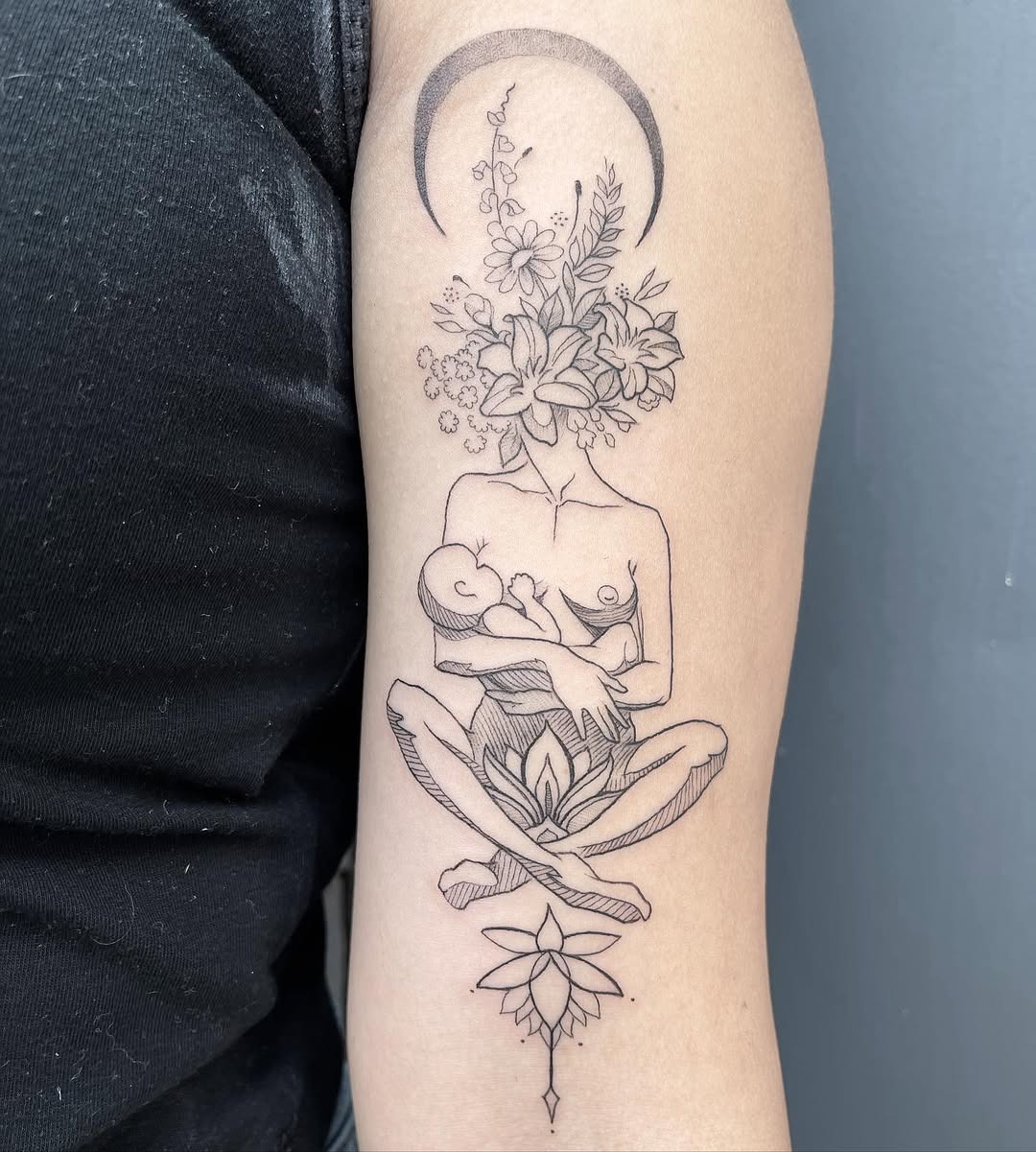 Symbolic motherly love depicted through artistry Tattoo Design