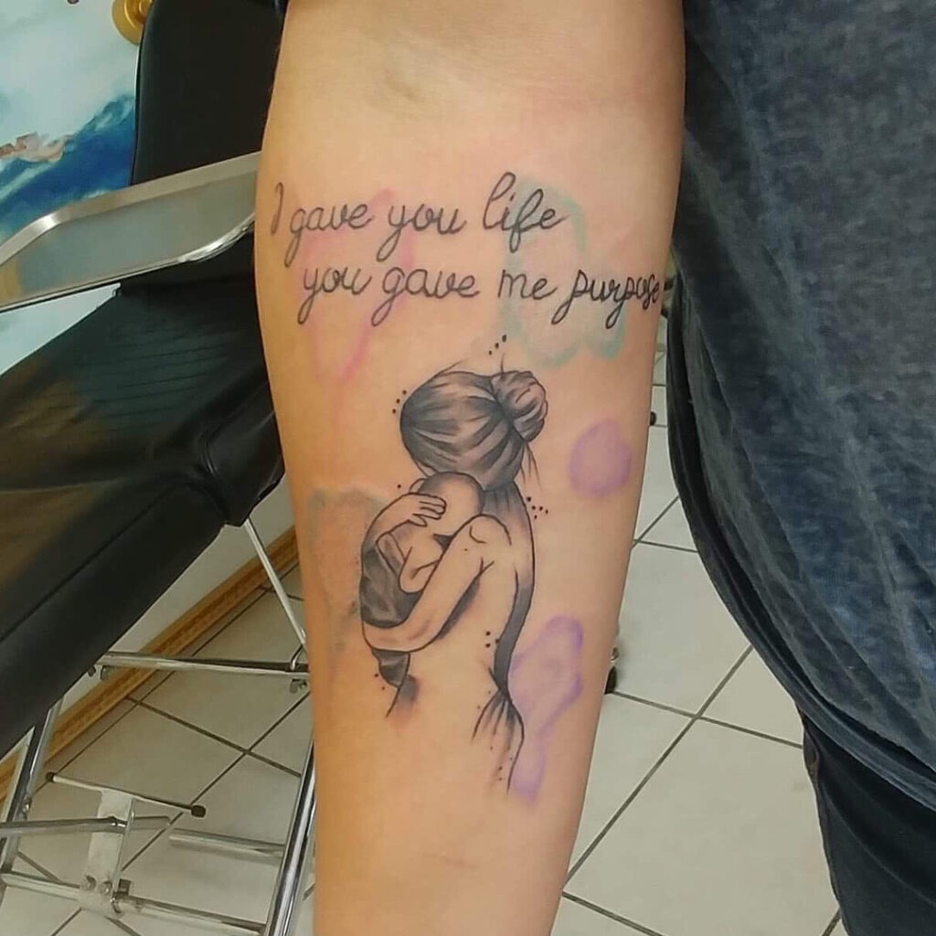 Mother’s Embrace with Meaningful Quote Tattoo Tattoo Design