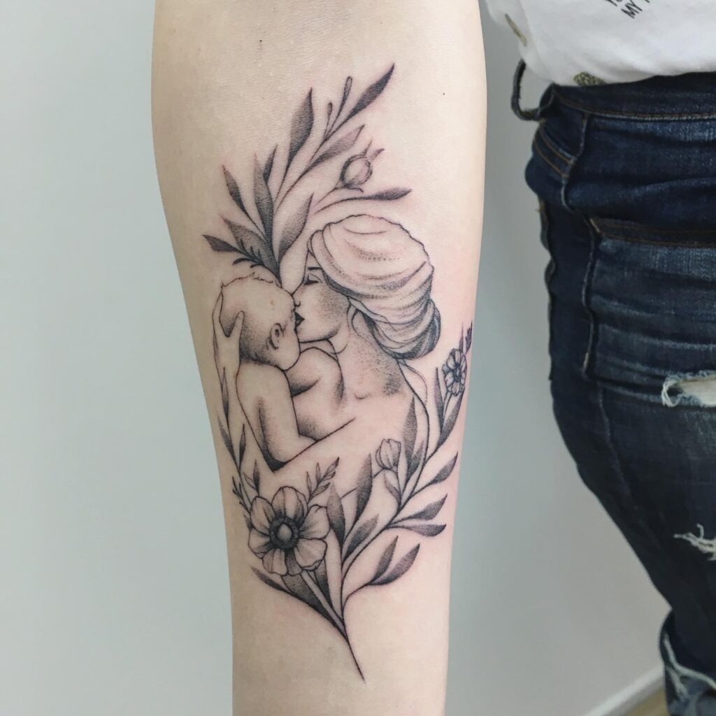 Mother’s Kiss and Floral Embrace Tattoo Tattoo Design