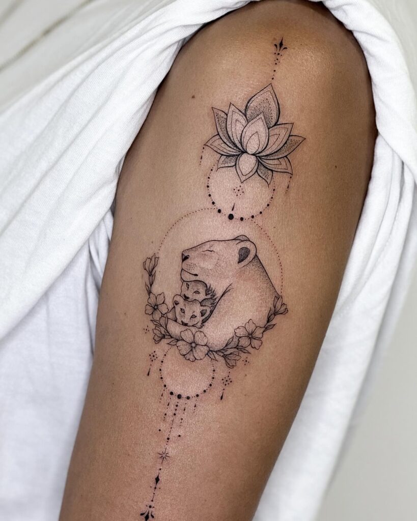 Delicate Lioness and Cubs with Lotus Tattoo Tattoo Design