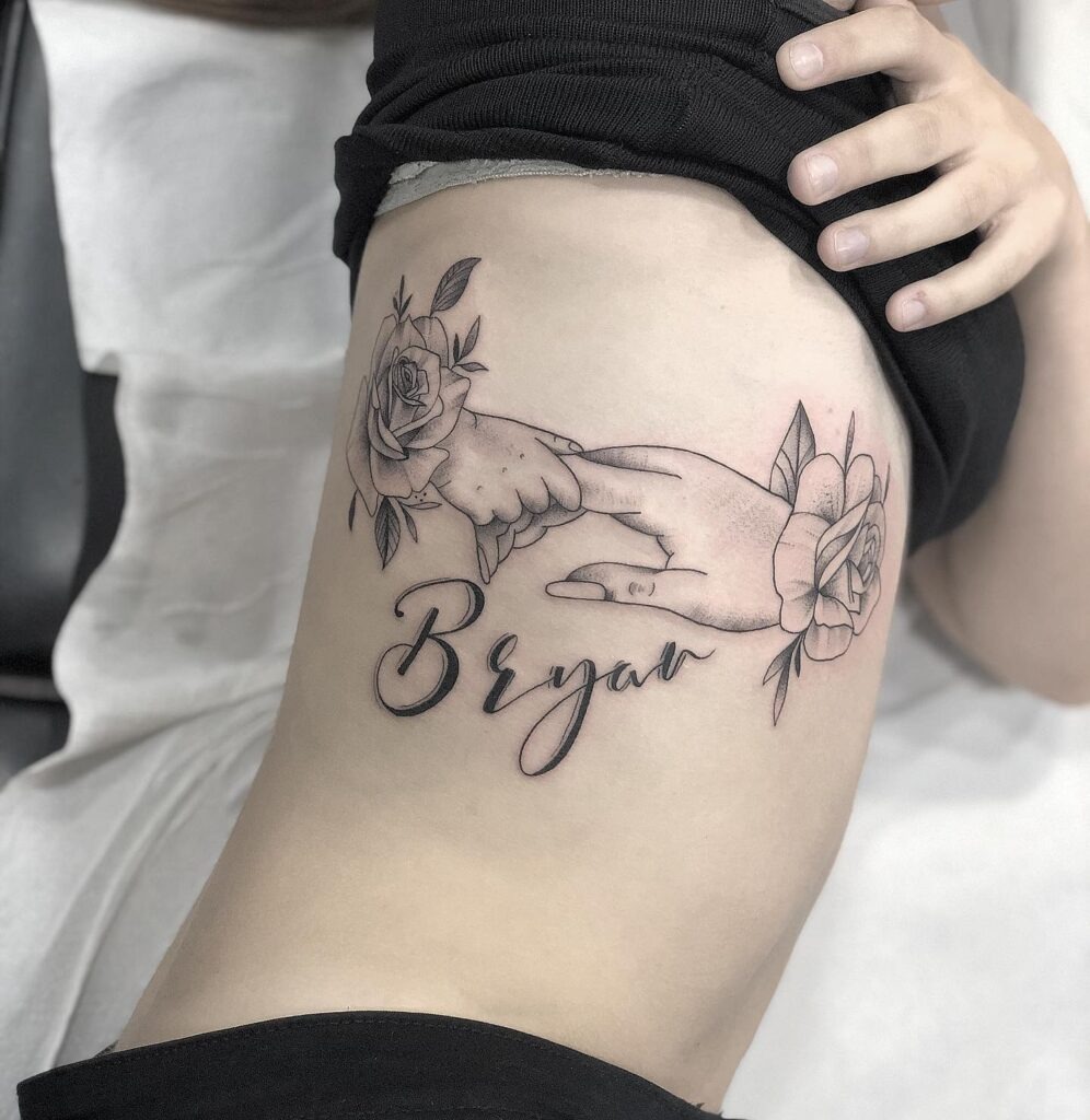 Mother and Child Hand Holding with Roses Tattoo Tattoo Design