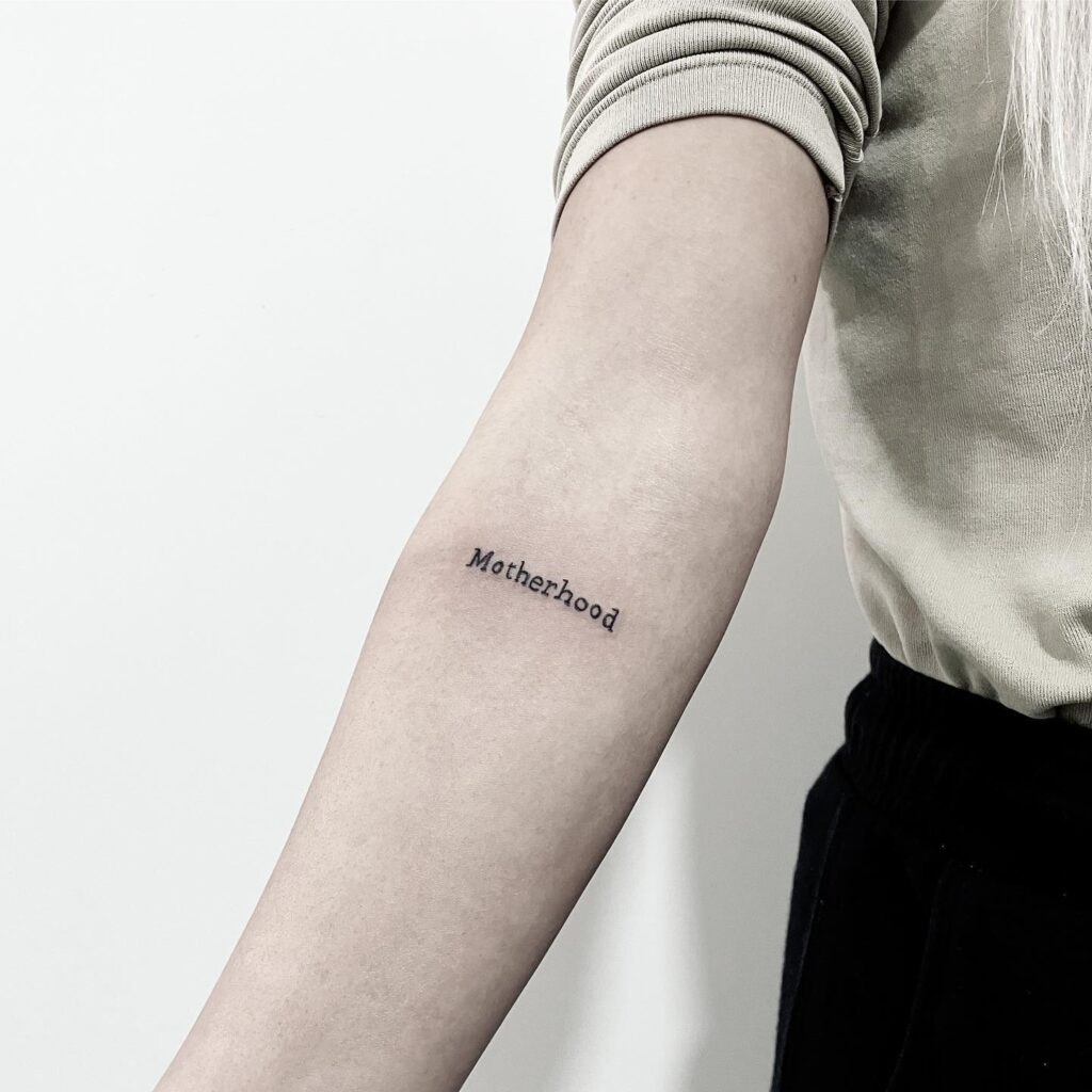 Simple Motherhood Script Tattoo Tattoo Design