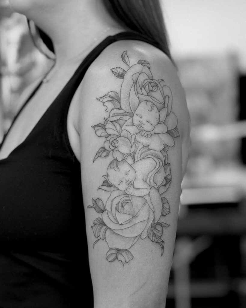 Sleeping Babies Among Roses Tattoo Tattoo Design