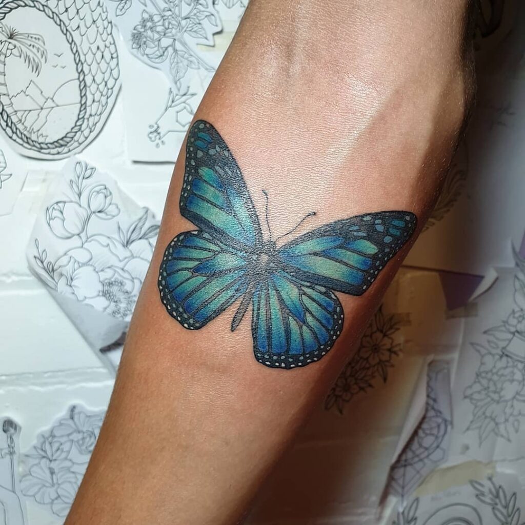 Blue Monarch Butterfly Tattoo on Forearm Tattoo Design
