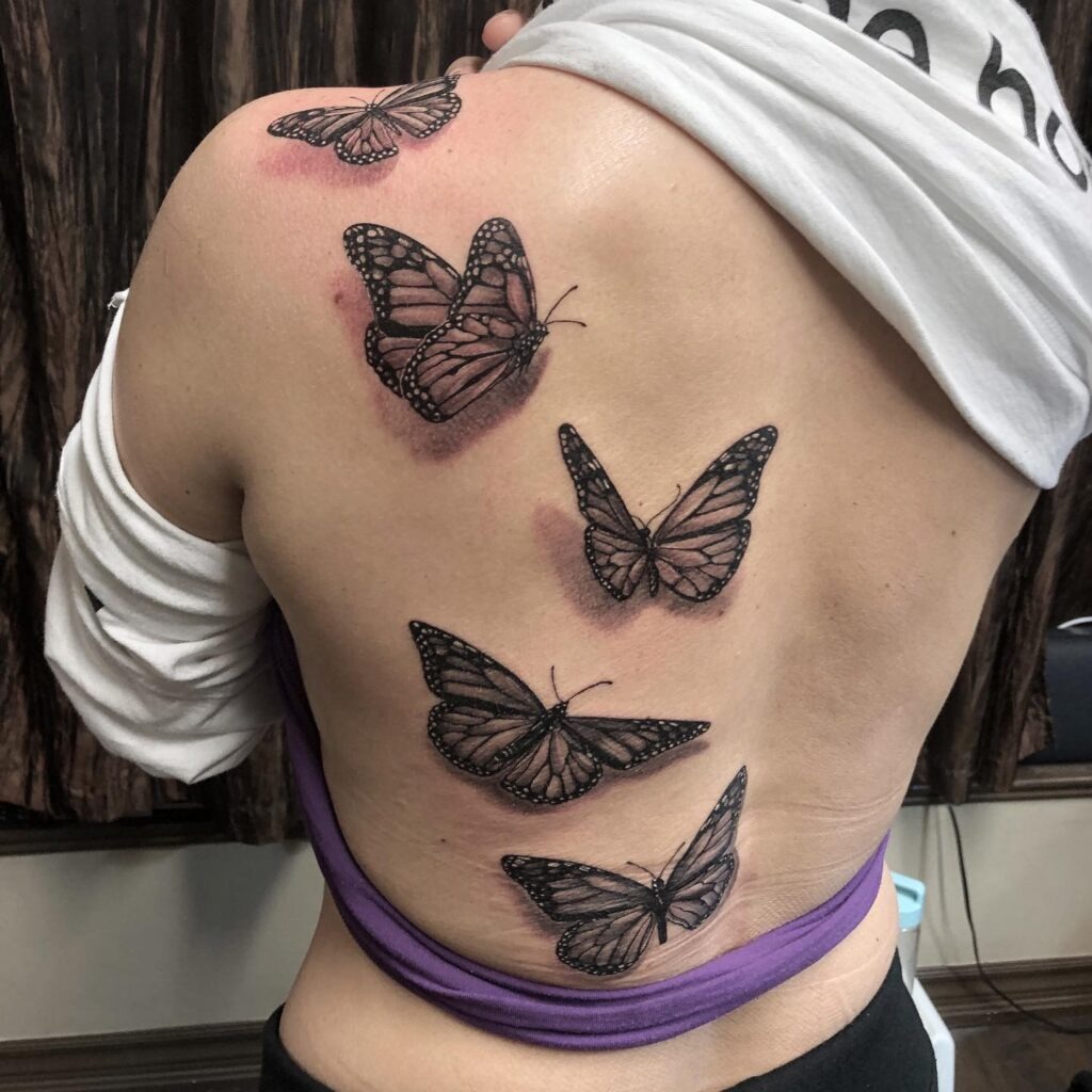 Five Monarch Butterflies Back Tattoo Tattoo Design