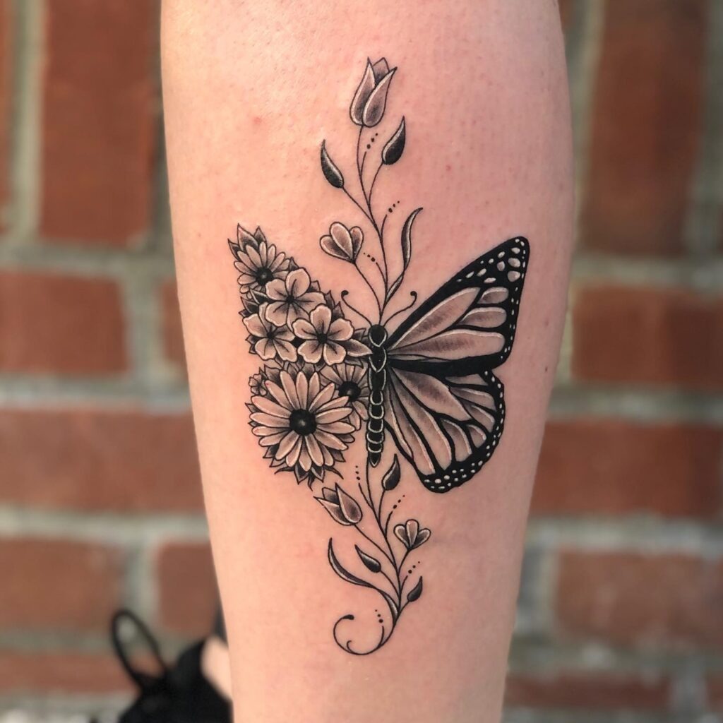Half Monarch Butterfly and Florals Tattoo Tattoo Design