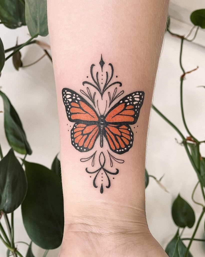 Monarch Butterfly Tattoo with Ornamental Accents Tattoo Design