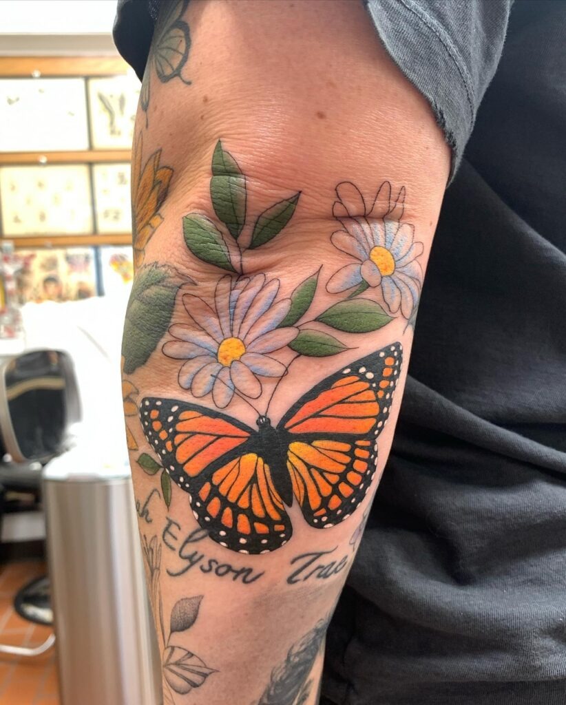 Monarch Butterfly with Daisies Elbow Tattoo Tattoo Design