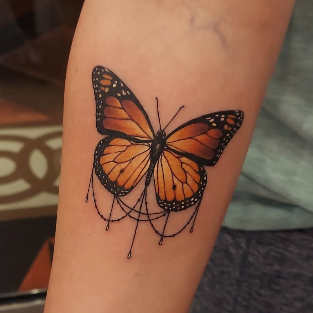 Neo-Traditional Monarch Butterfly Tattoo with Geometric Strings Tattoo Design