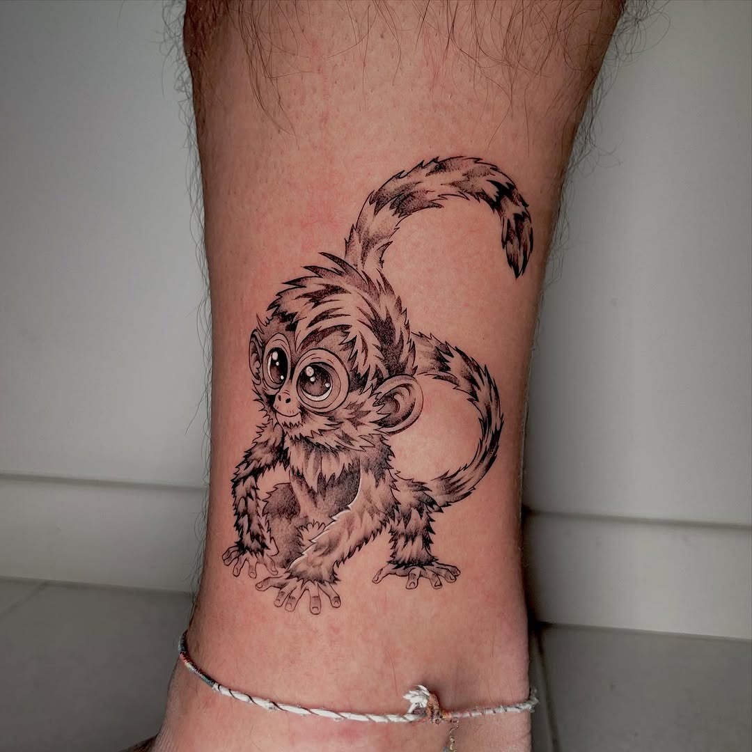 Adorable monkey tattoo for playful spirits Tattoo Design