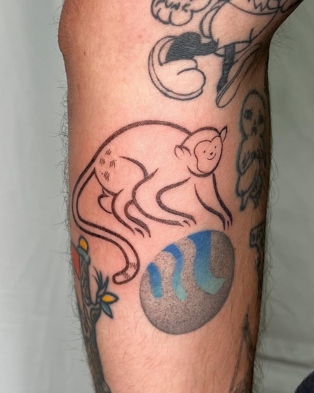 Artistic monkey tattoo bringing playful vibes Tattoo Design