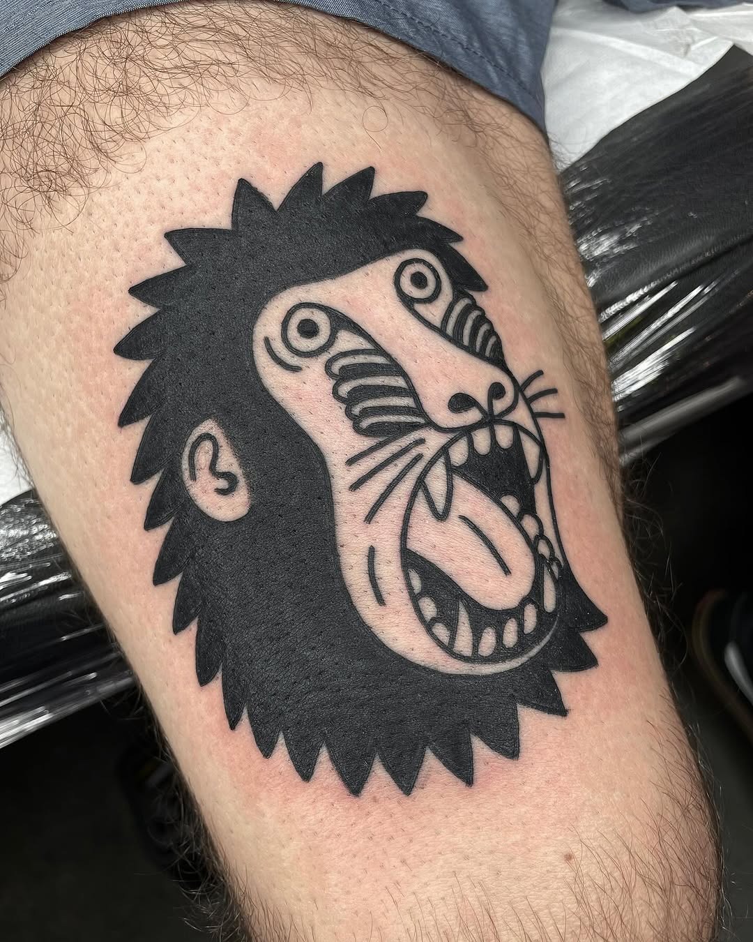 Bold Black Monkey Tattoo with Unique Features Tattoo Design