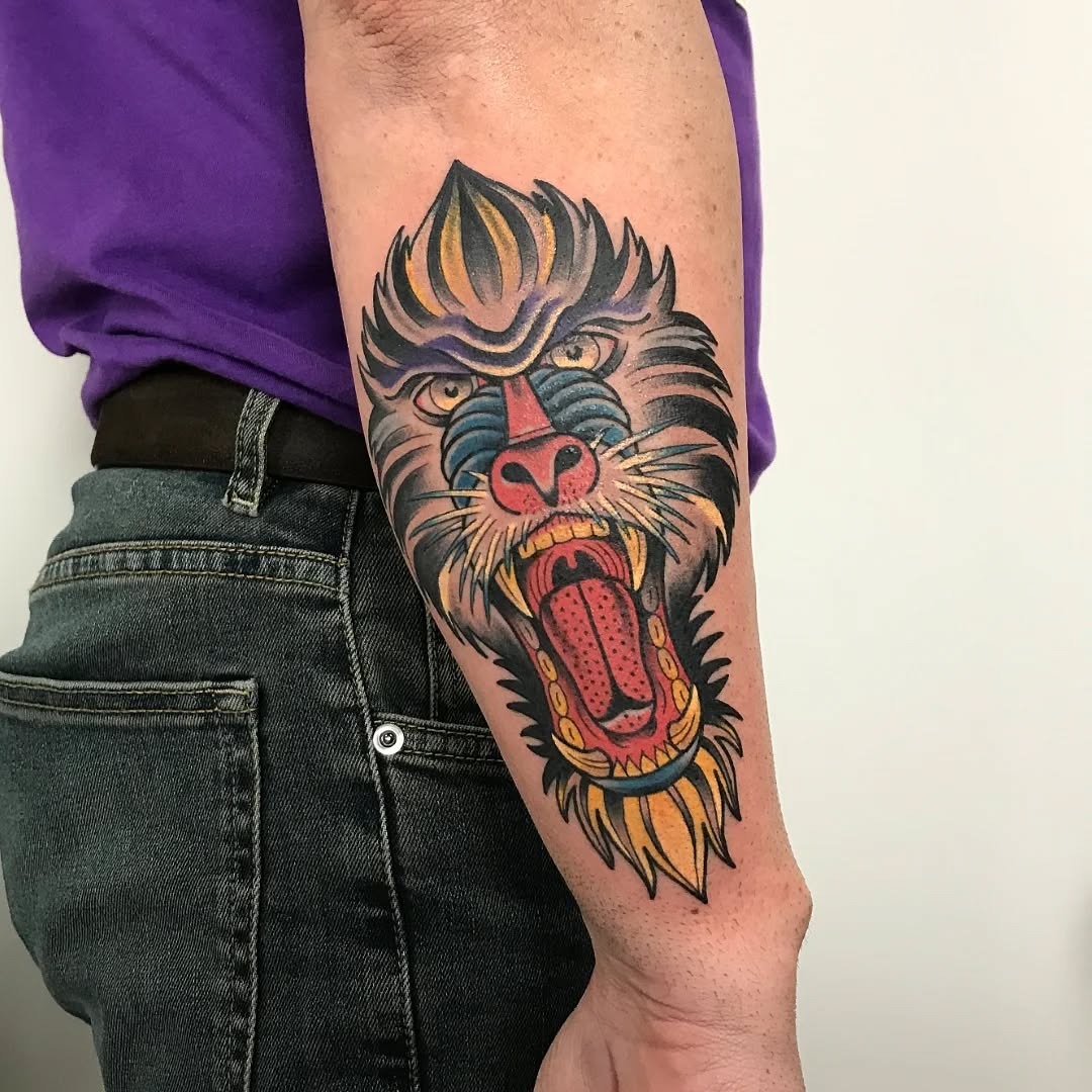 Bold monkey tattoo radiates strength and personality Tattoo Design