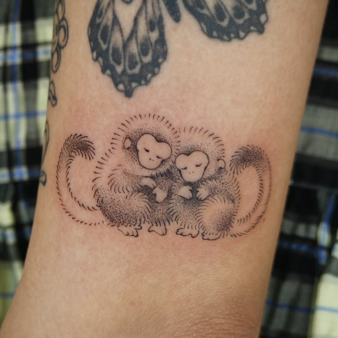 Charming duo of cuddly monkey tattoos Tattoo Design